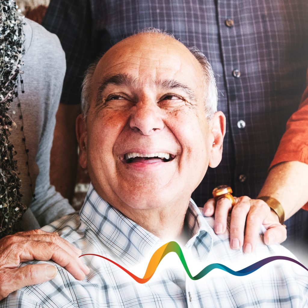 rhythms home care senior man surrounded by family