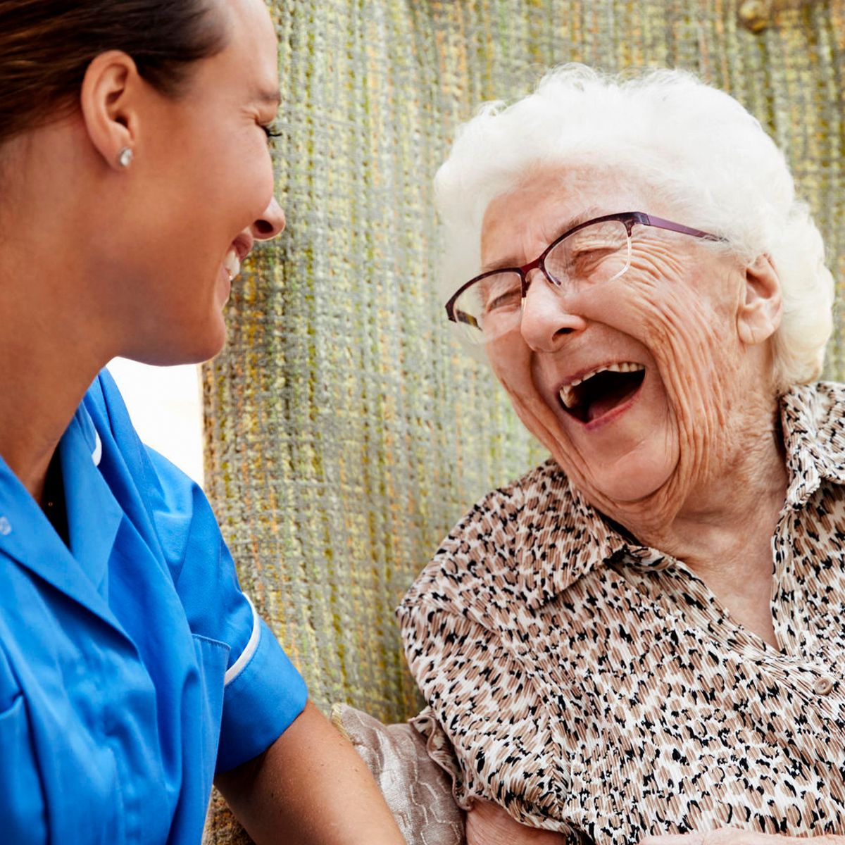 caregiver with client laughing