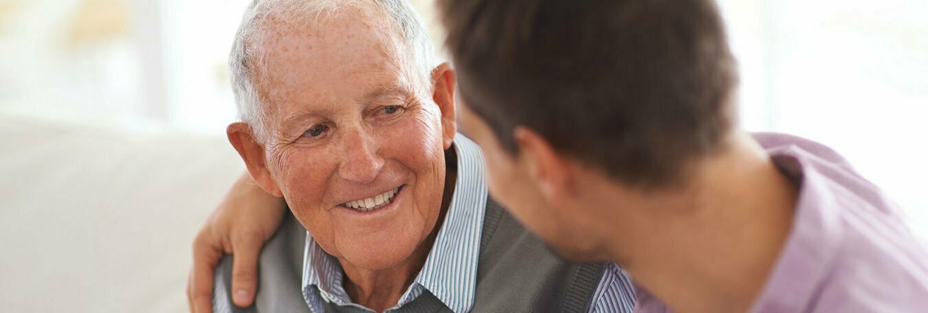 head shot of two friends talking