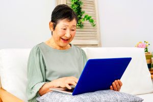 rhc senior woman on laptop smiling rhc senior woman on laptop smiling